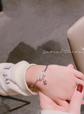 足银999纯银在逃公主蝴蝶结手镯儿童小孩满月宝宝铃铛童镯女一对