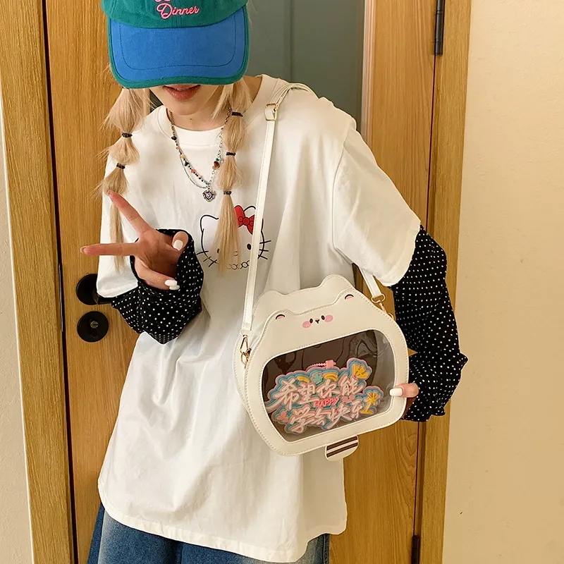 奶茶原创浣熊痛包可爱大容量单肩挎包女生斜跨包日常百搭透明娃包
