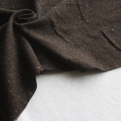 新品羊毛混纺布料咖色色织彩点中厚秋冬服装面料140cm宽1米价