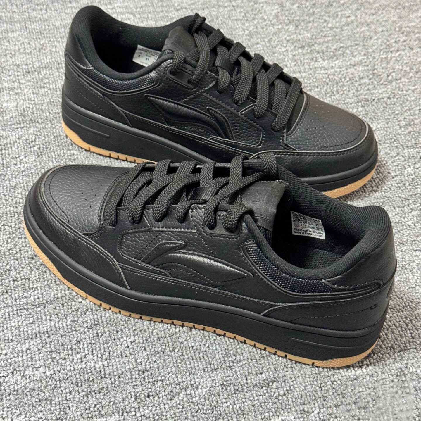 天迹黑色厚底板鞋男休闲鞋