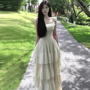 小飞袖吊带连衣裙女蕾丝拼接大裙摆收腰海边度假超仙中长款蛋糕裙