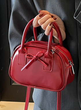 小众设计芭蕾风红色手拎包女2026新款春季百搭新娘包单肩斜挎婚包
