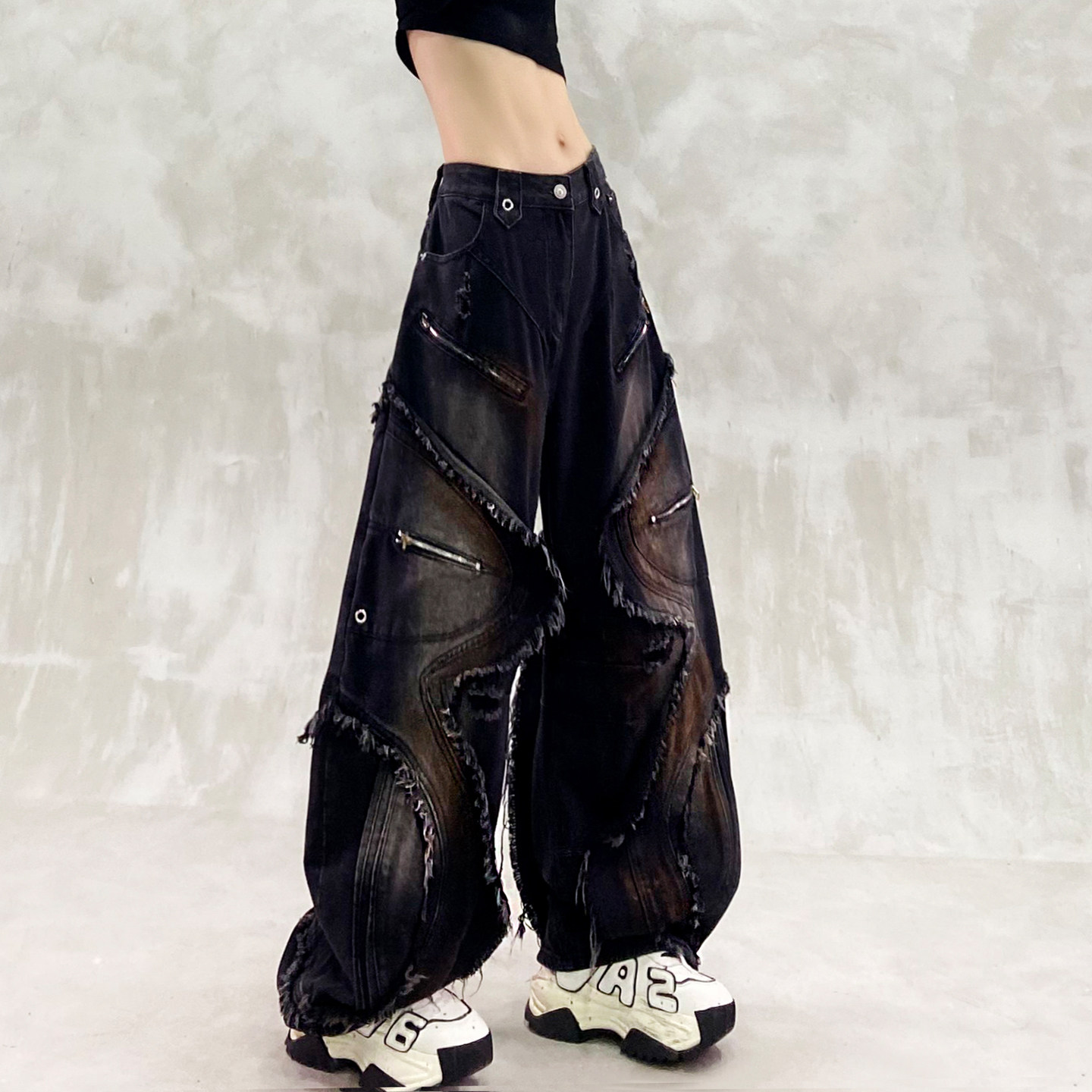 不规则毛边拼接休闲牛仔裤女