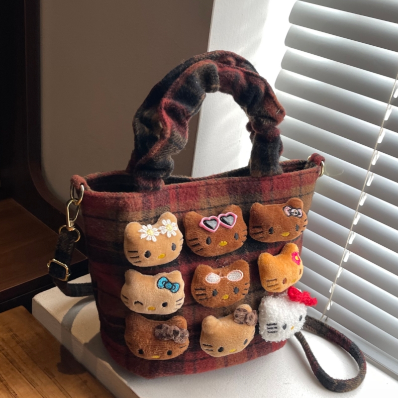 小众可爱公仔手拎包女式2025新款秋冬时尚复古格纹毛呢单肩斜挎包