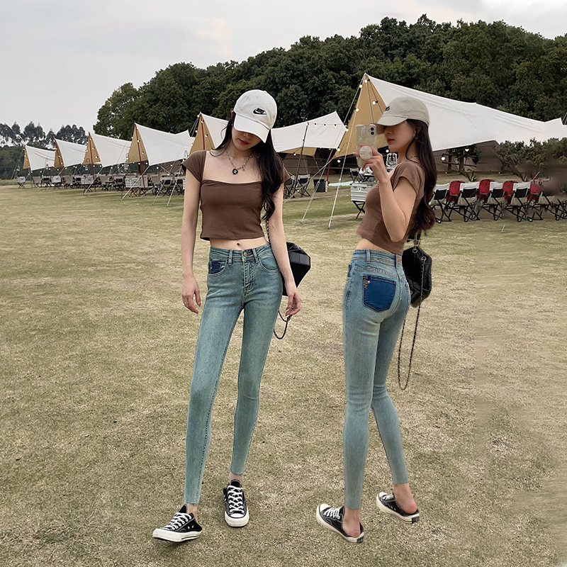 后袋撞色磨破紧身显瘦小脚牛仔裤