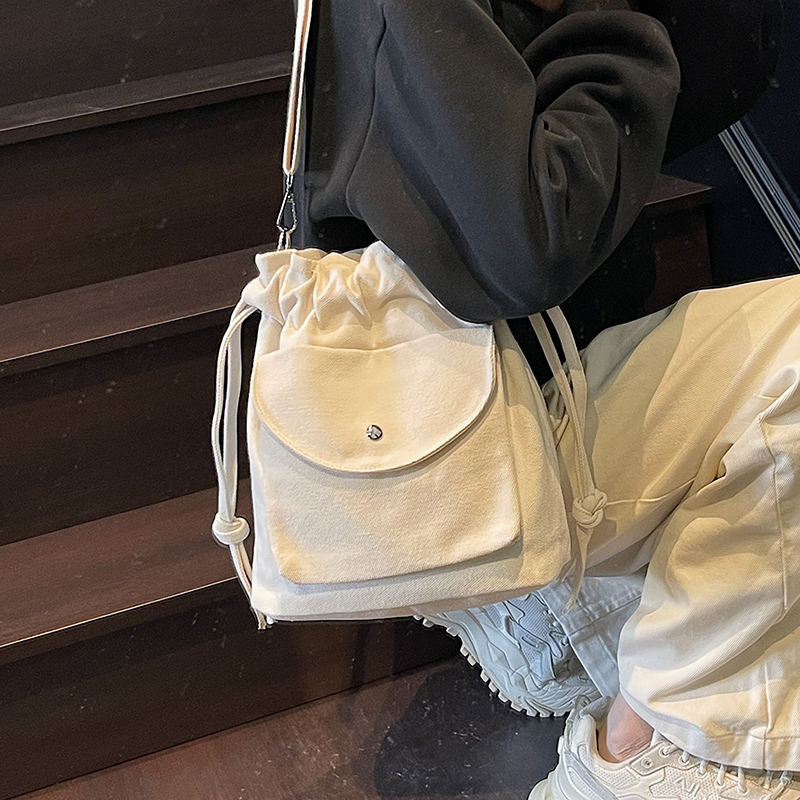 ZATZ简约休闲帆布抽绳水桶包