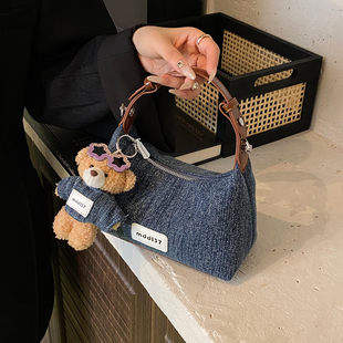 休闲质感手拎小包包女2025新款夏季时尚牛仔饺子包百搭ins斜挎包