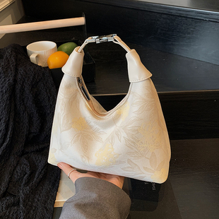 国风新中式手拎小包包女2025新款潮时尚斜挎包夏季小众通勤饺子包