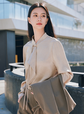 XG雪歌2026春国风盘扣荷叶边智性通勤缎感暗纹衬衫女XL121022A263