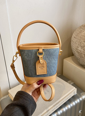 2026新款洋气女童水桶包包迷你手拎出游单肩斜挎包公主时尚拼接包