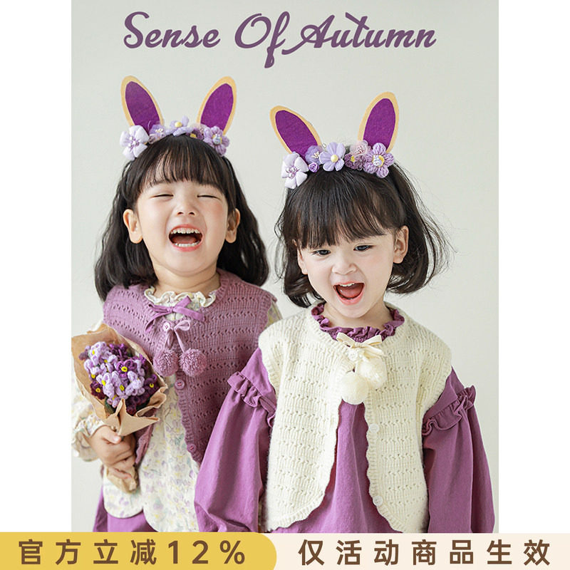 幼悠时尚毛球系带马甲图片