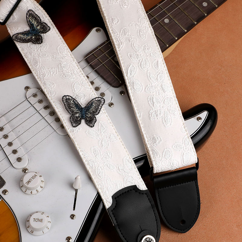 牛皮头白色立体花卉蝴蝶通用吉他背带适用电吉他电贝斯民谣木吉他