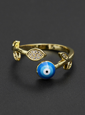 钛钢镶钻树叶蓝眼睛戒指