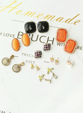 12欧美复古黄色黑色猫咪镶嵌锆石方格粉色骷髅头金色木马耳环耳钉