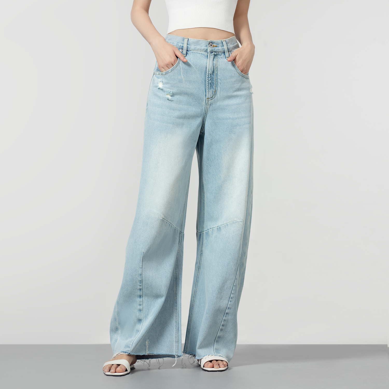 潮奢解构设计感破坏弯刀牛仔裤女