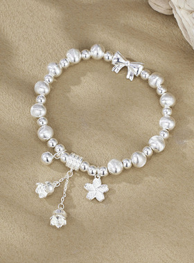 国潮新款猫眼花朵蝴蝶手链手工编织手链男女生通用手绳小众设计