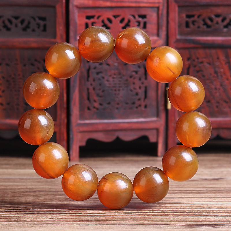 西藏琥珀色满血羊角圆