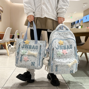 书包初中女生蓝色小学生高中生高颜值2026春夏男大容量双肩包背包