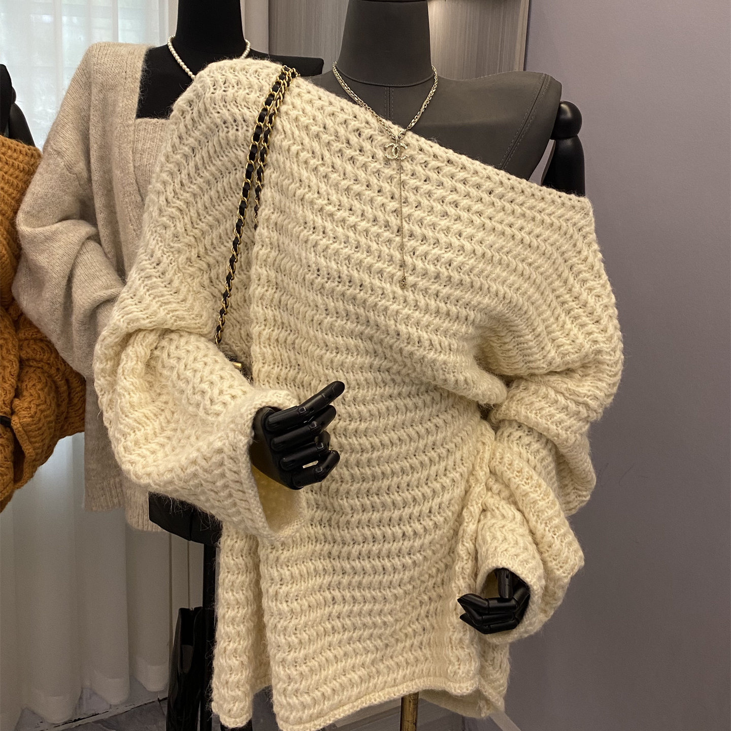 斜肩长袖宽松纯色毛衣针织衫上衣