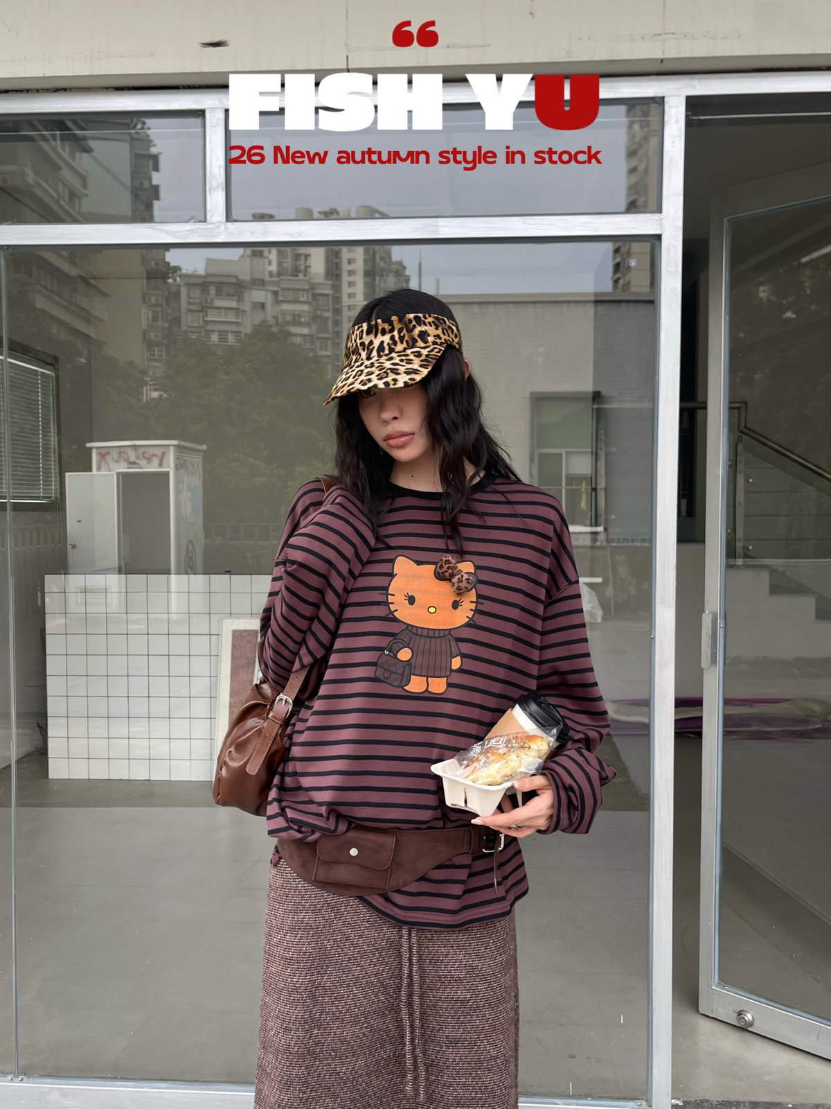 FISH YU美式复古卡通黑皮KT立体毛绒蝴蝶结条纹长袖T恤626591