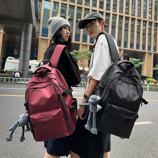 大容量双肩背包大学生休闲电脑包男防水旅行袋纯色初高中学生书包