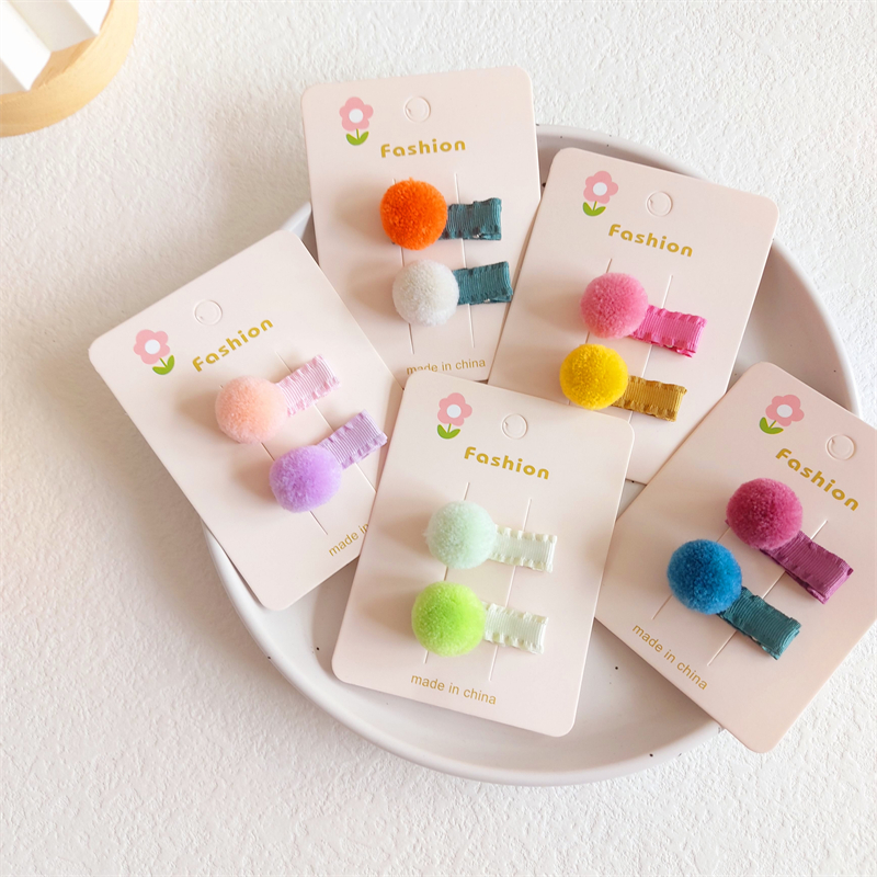 韩版婉瑜女童包布平夹彩色毛球