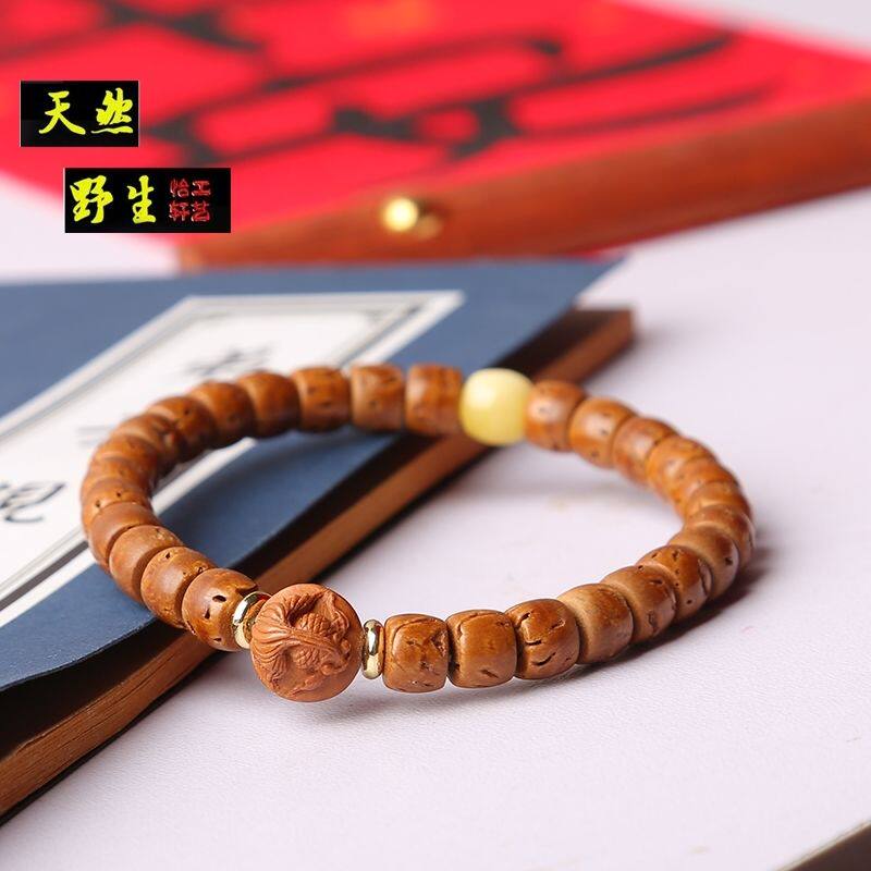 脑纹桃核核壁直切手串7x6老型 龙纹桃核纯手工雕刻金鱼配饰