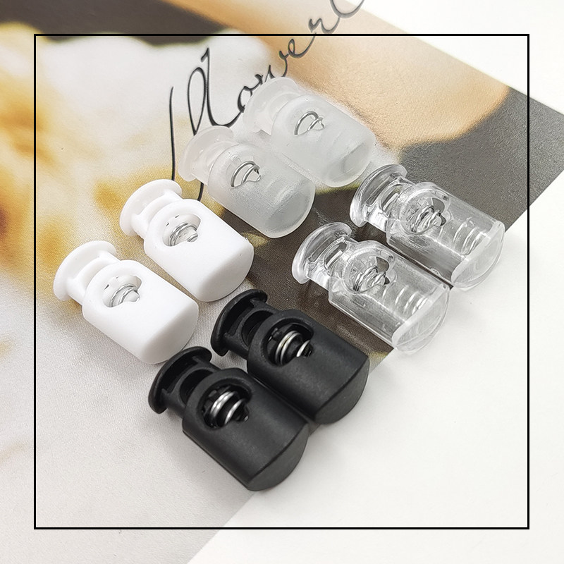 现货塑料单孔扁形弹簧扣黑白透明弹力绳子调节卡扣服饰箱包配件扣