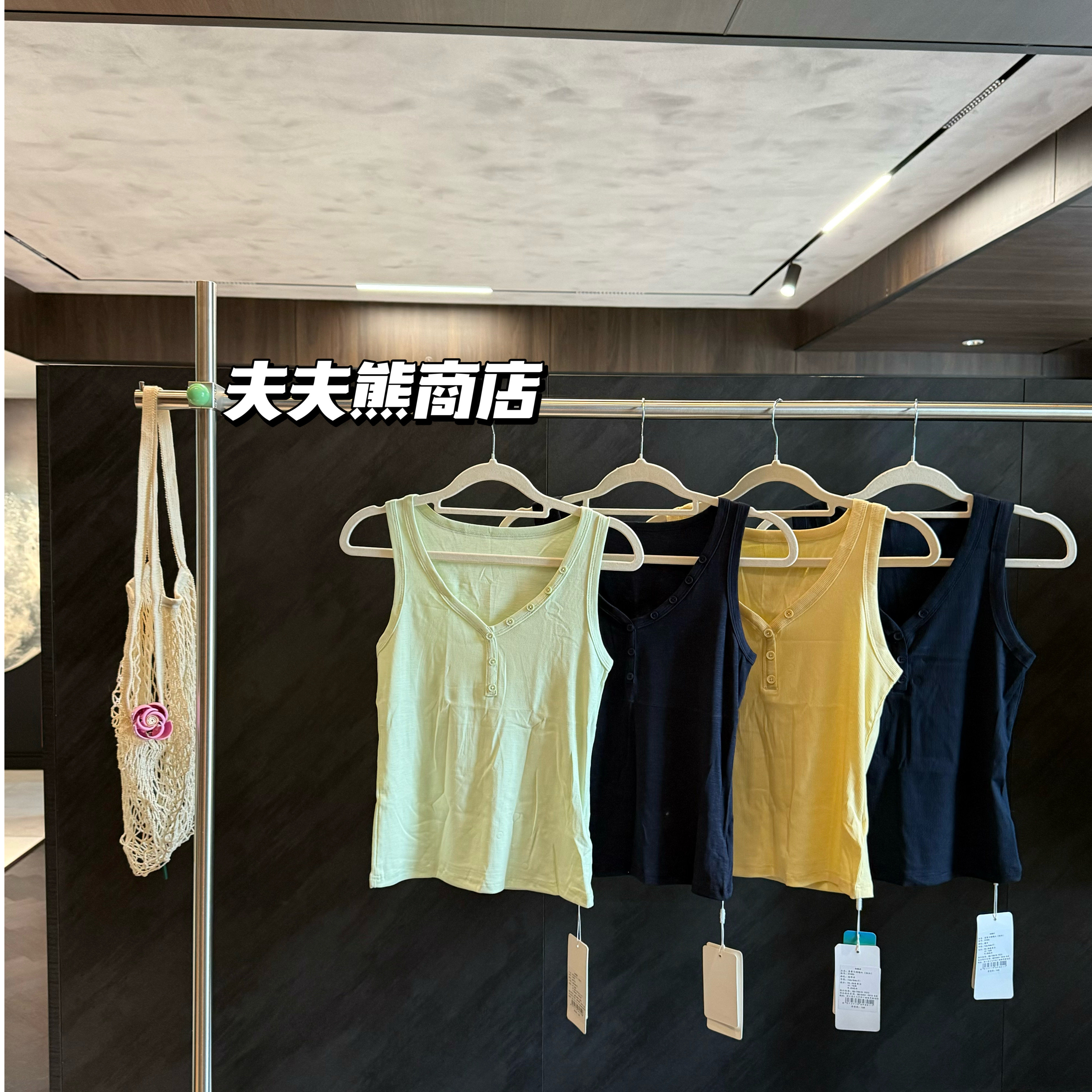 佐丹伊春夏时尚纽扣棉亚麻背心女