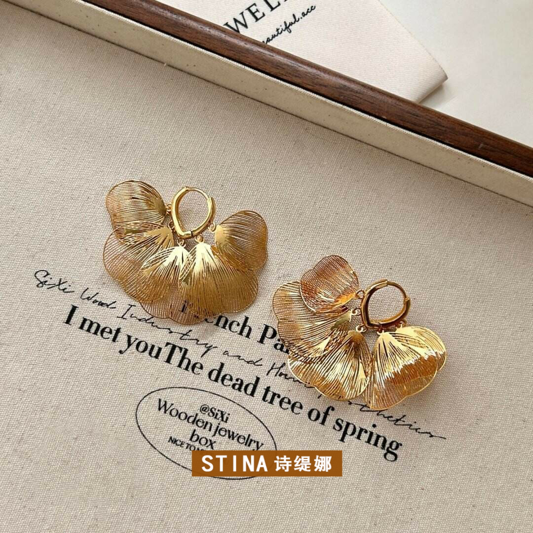 STINA镂空花瓣形流苏耳环独特20