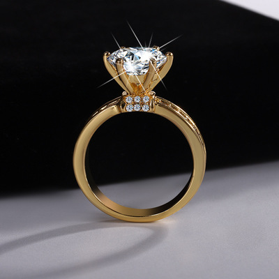 厂家热销S925银莫桑石高冠皇后女戒指镀黄金钻石仿真求婚结婚钻戒