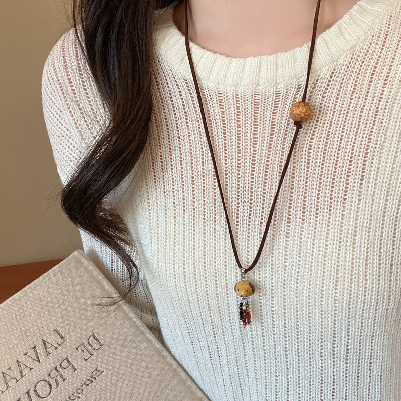 可爱陶瓷小狗吊坠抽拉编织绳项链女秋冬长款挂脖毛衣链小众配饰品