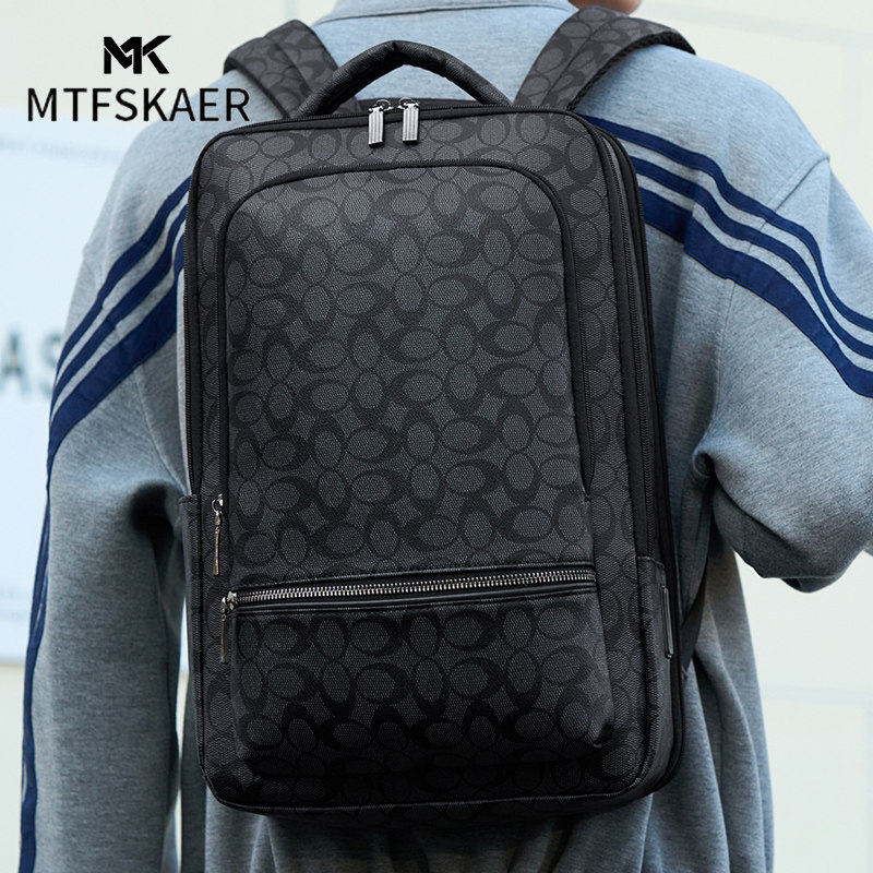 MTFSKAER高档轻便大容量真皮双肩包男士商务通勤电脑包旅行背包男