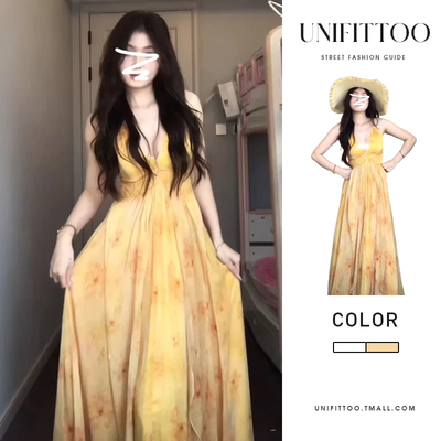 法式黄色v领吊带连衣裙子女装2024夏季新款海边度假收腰挂脖长裙