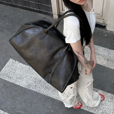 中古不规则托特包2025新款手提单肩旅行大包做旧皮异形通勤腋下包