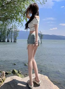 美式复古毛边牛仔短裤女2025夏季新款高腰显瘦辣妹包臀热裤