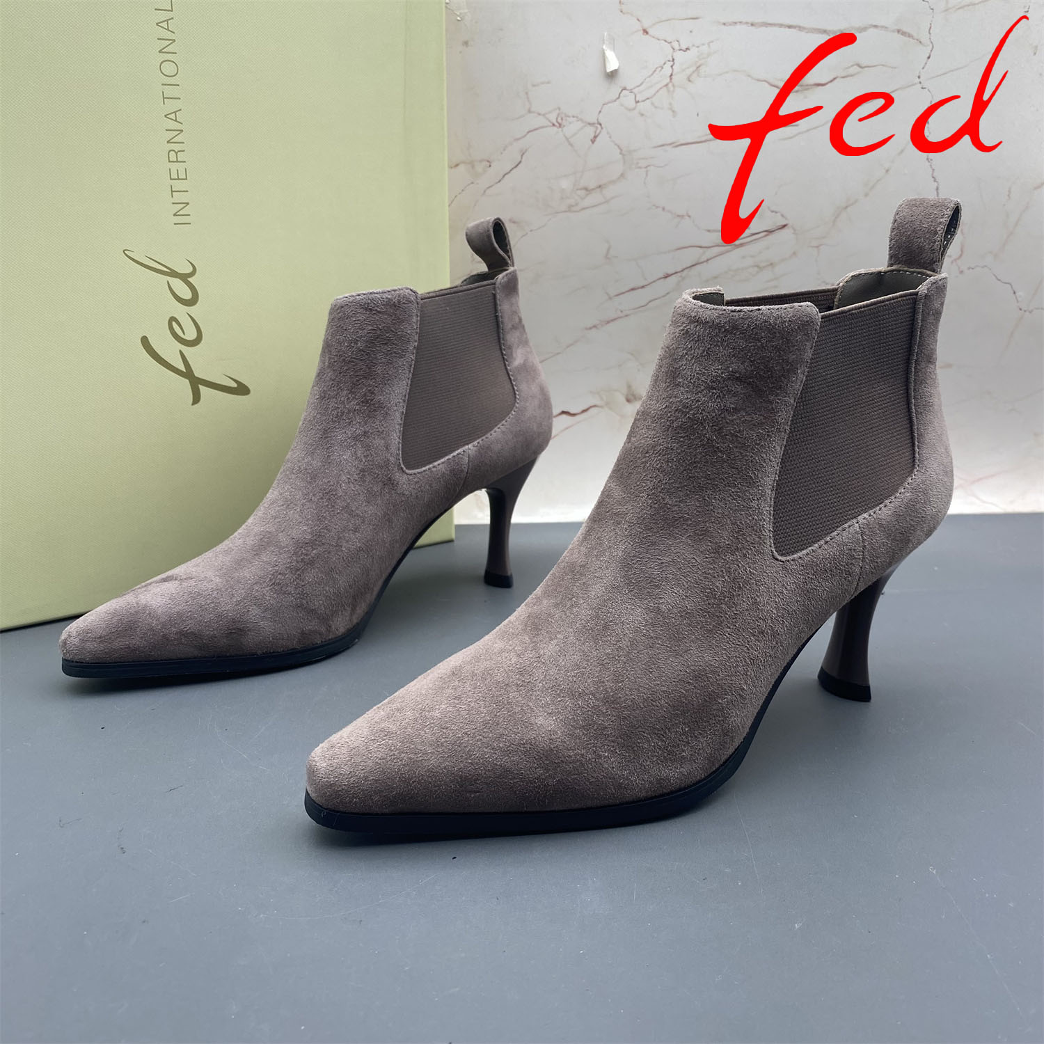 37码fed/艾芙伊迪撤柜断码羊皮女鞋细跟高跟套筒尖头时尚时装短靴