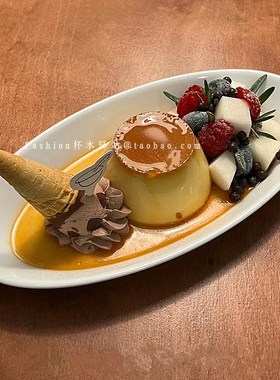 创意白色陶瓷长条椭圆形寿司盘简约高级感特色点心碟子甜品蛋糕盘