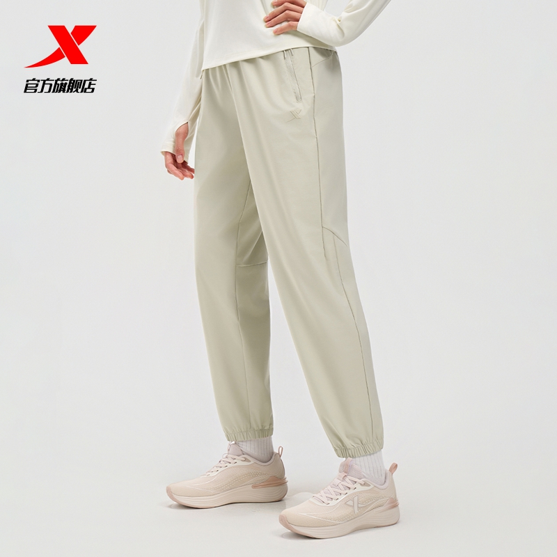 特步运动裤女2025年秋季新款健身跑步梭织女子运动裤975328690046