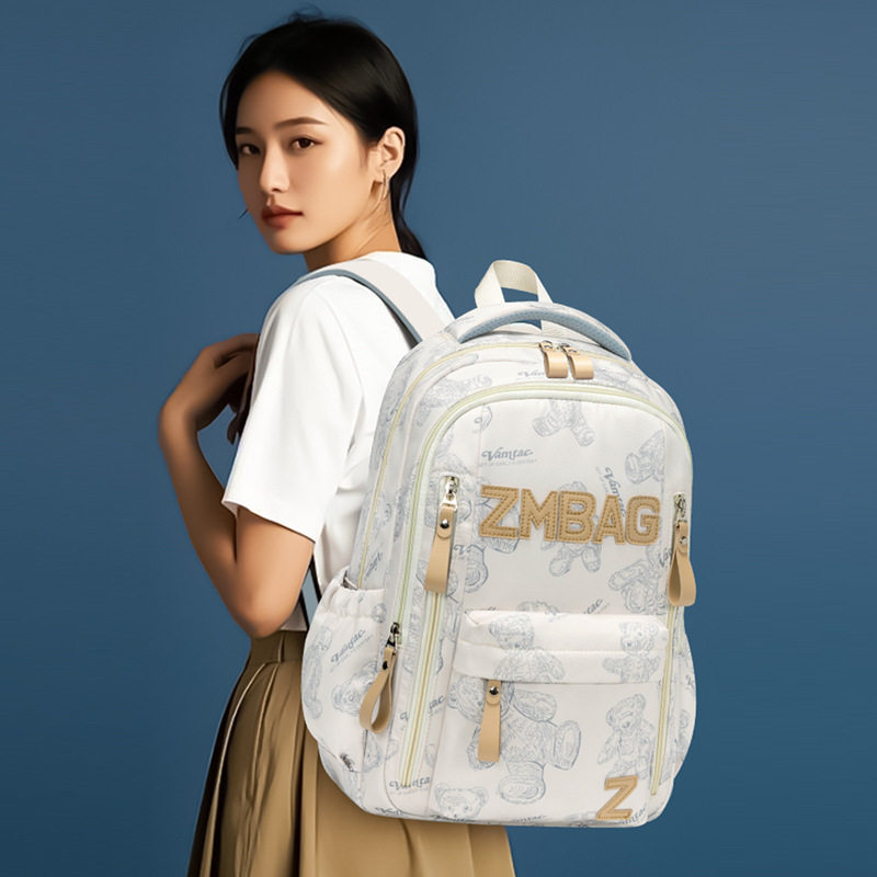 芝麻宝贝时尚涂鸦双肩包男女款休闲旅行大容量背包百搭初高中