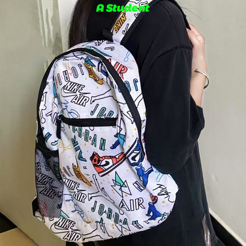 随机涂鸦个性中号双肩包书包