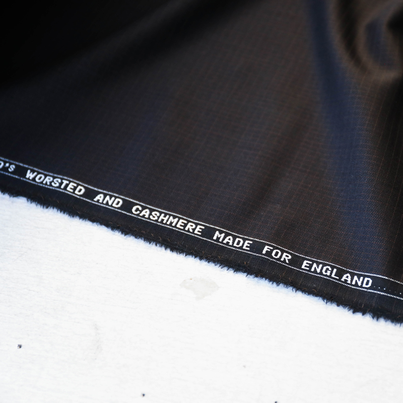 英格兰进口薄款黑底橘黄色细线格纹细腻斜纹高支精纺羊毛布料面料