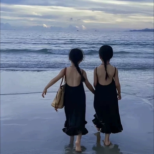 女童高级感露背度假连衣裙2025夏季新款中大童吊带裙海边沙滩裙子