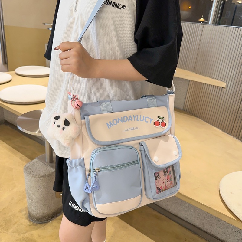 单肩包女2025新款可爱大容量小学生补习手提袋高颜值初中生斜挎包