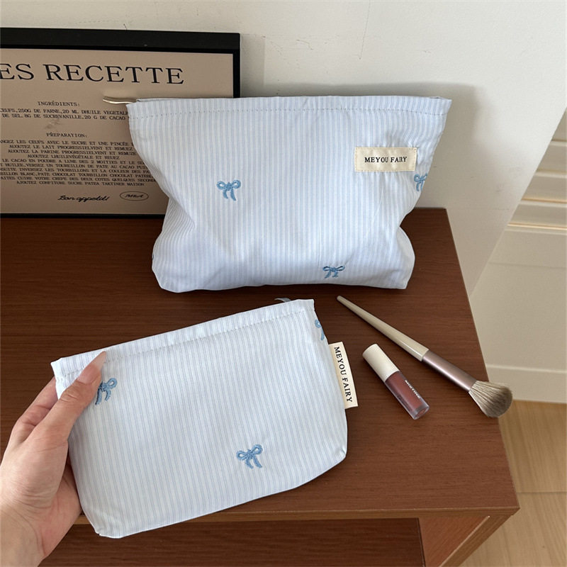 简约小领结布艺化妆包便携护肤品收纳包旅行手拿洗漱内胆包内衣袋