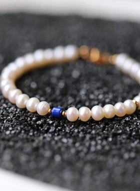 入锦女款珍珠手链设计款