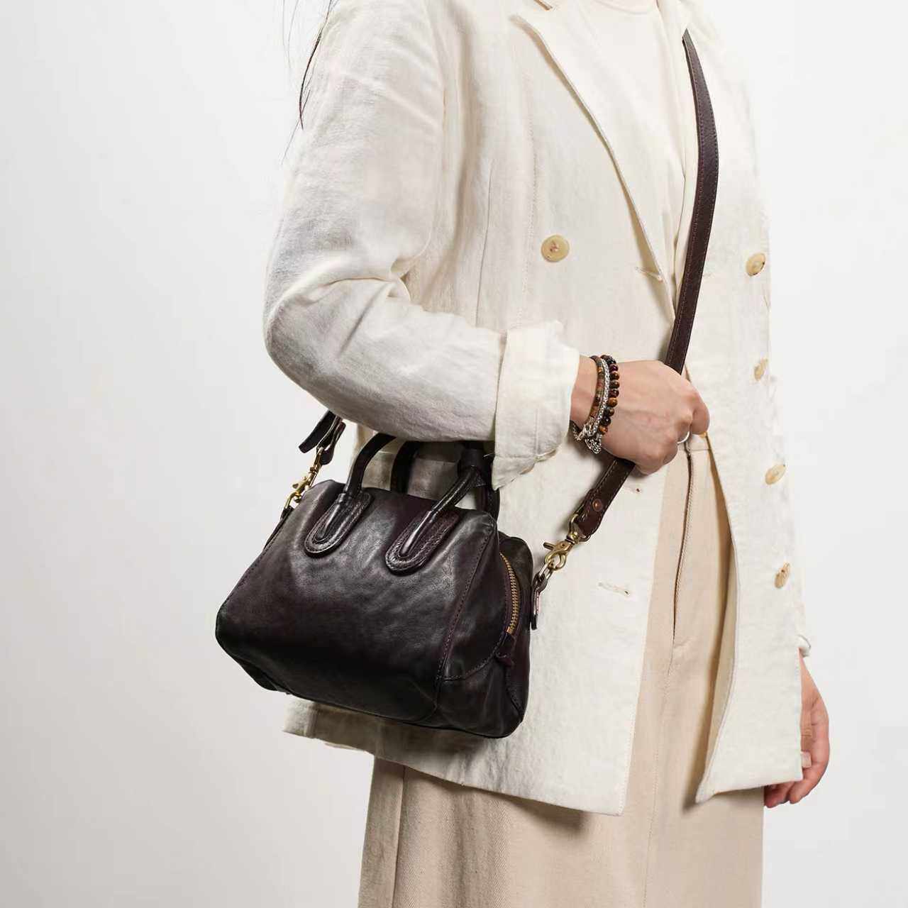 帆布配牛皮尾单单肩手提女水桶包