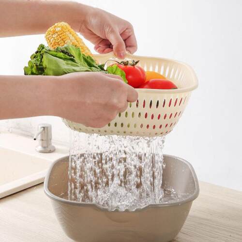 Two-layer vegetable washing basin with a draining basket, ki