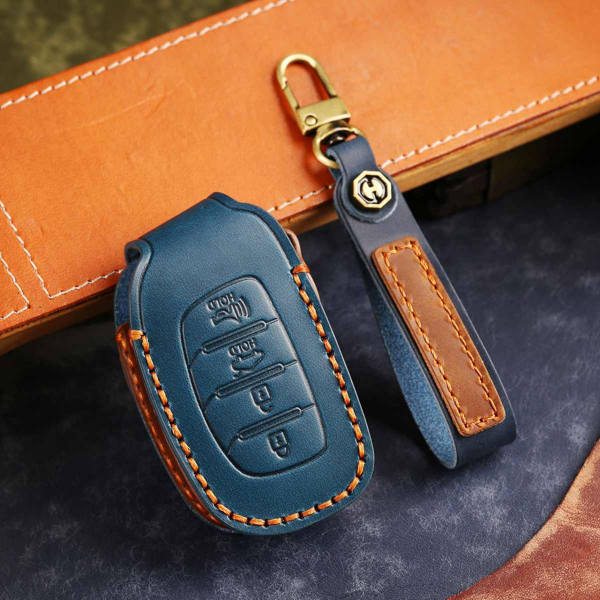 适用于北京现代ix35钥匙套领动朗动悦纳名图ix25途胜瑞纳真皮包扣