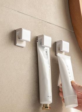 Wall-mounted toothpaste holder with no drilling required, su